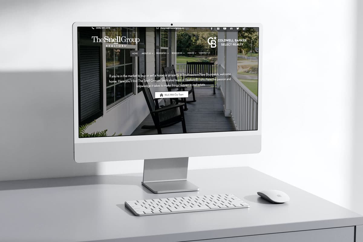 Website by The Pridham Group displayed on an iMac.