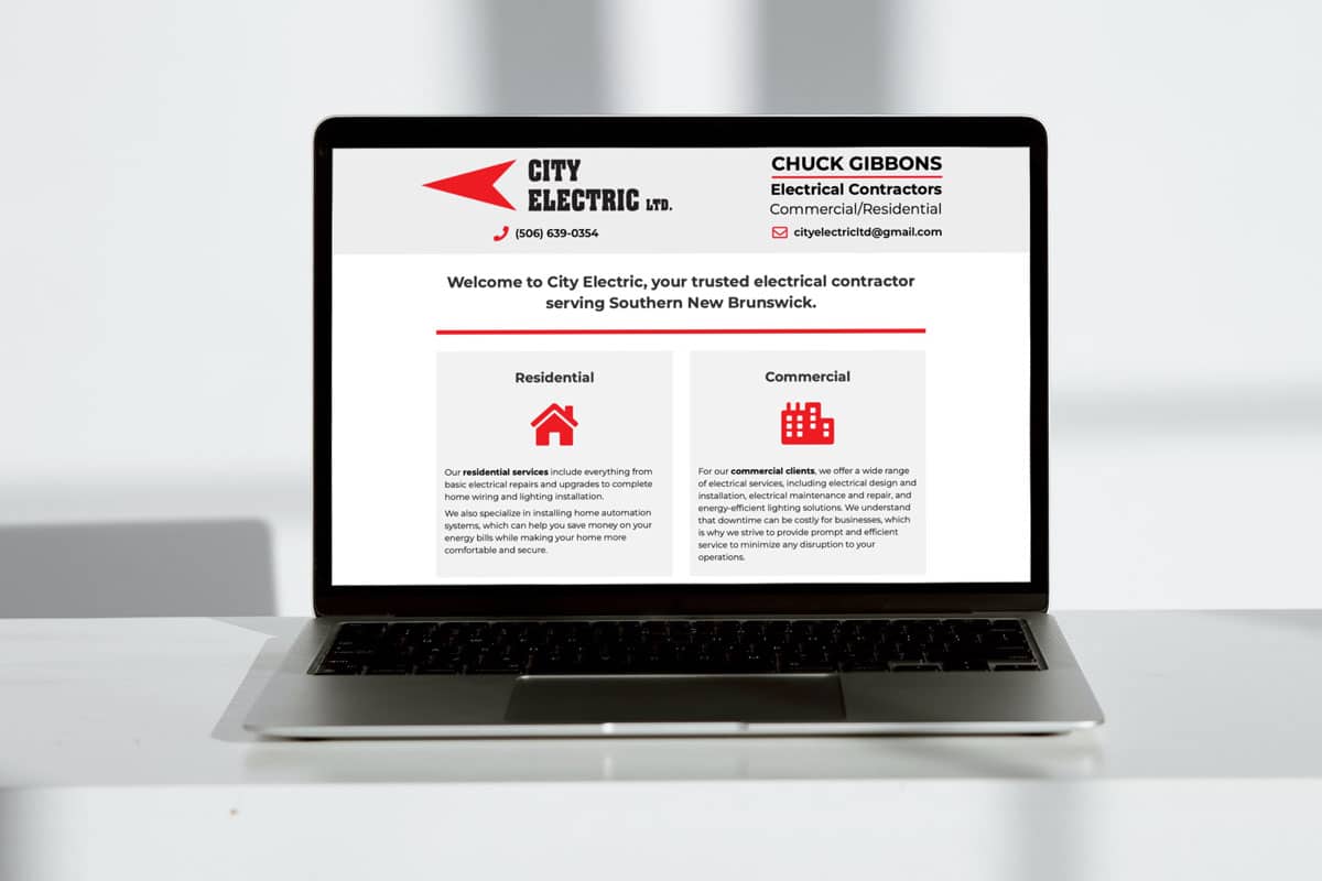 The City Electric Electrician website design displayed on a laptop.