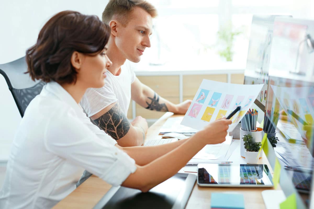 Designers working on branding and logo design